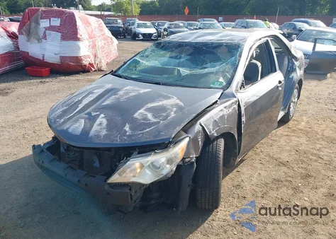 2014 Toyota Camry Le z USA, uszkodzony, nr VIN 4T4BF1FK9ER341677